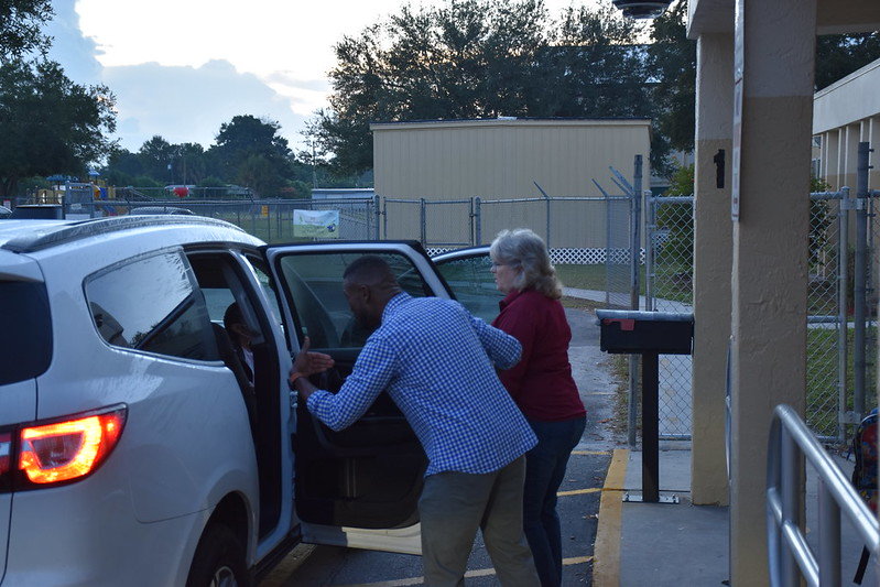 Indiantown's vice mayor, Anthoney Dowing and council member Susan Gibbs-Thomas greeted Warfield Elementary students arriving for classes Friday, Oct. 22 in celebration of Florida City Government Week .