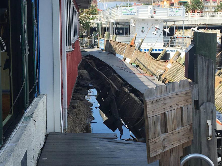 Damage to dock at Tin City in Naples caused by storm surge from Hurricane Irma in 2017.