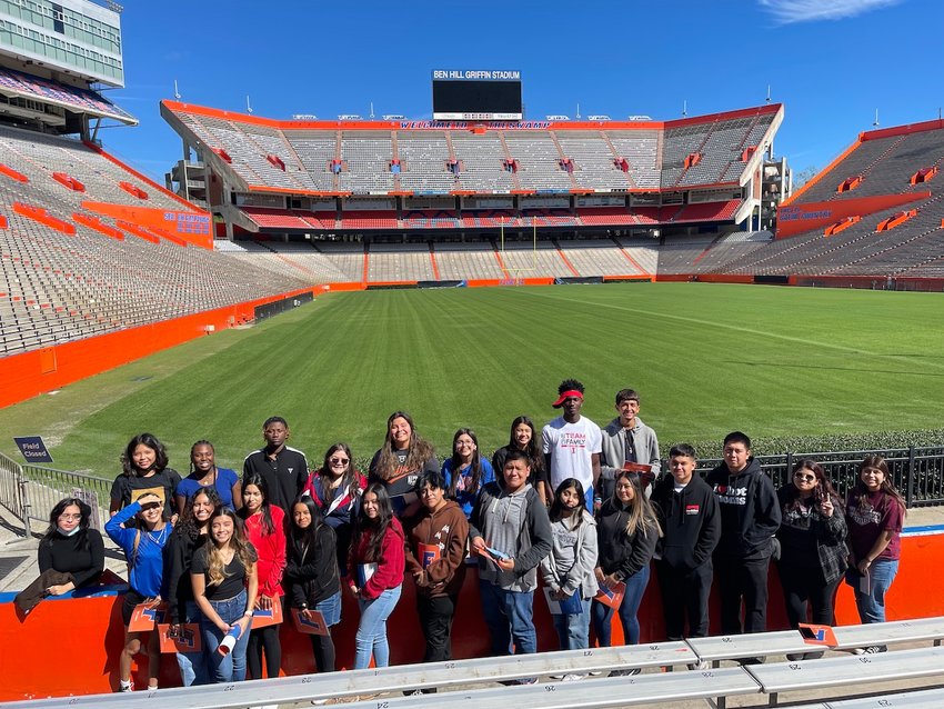 Immokalee Foundation juniors pose for a photo at University of Florida's Ben Hill Griffin Stadium.