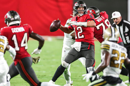 Tampa Bay Buccaneers quarterback Tom Brady (12) looks for a receiver during an NFL game against the New Orleans Saints, Sunday, Nov. 8, 2020 in Tampa, Fla. The Saints defeated the Buccaneers 38-3. (Margaret Bowles via AP)