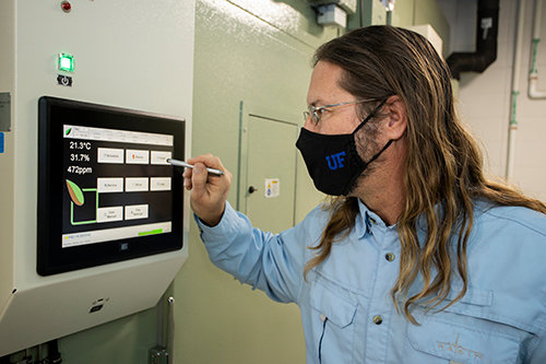 Touch screens allow scientists to control the conditions inside each growth chamber.