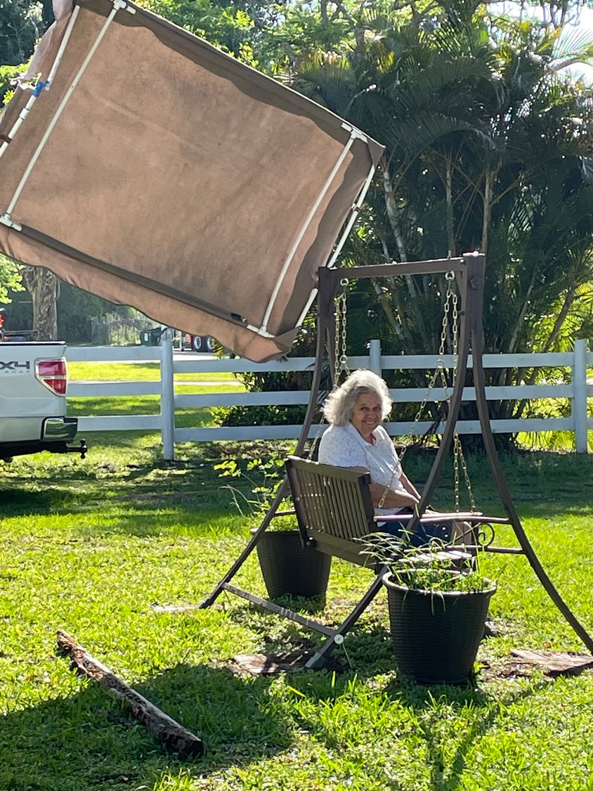 OKEECHOBEE - Despite 19mph winds on Thursday, March 18, local woman, Kathy Womble said it was a great day. "It's nice and cool out here." Even having the swing canopy ripped off its frame did not phase her.