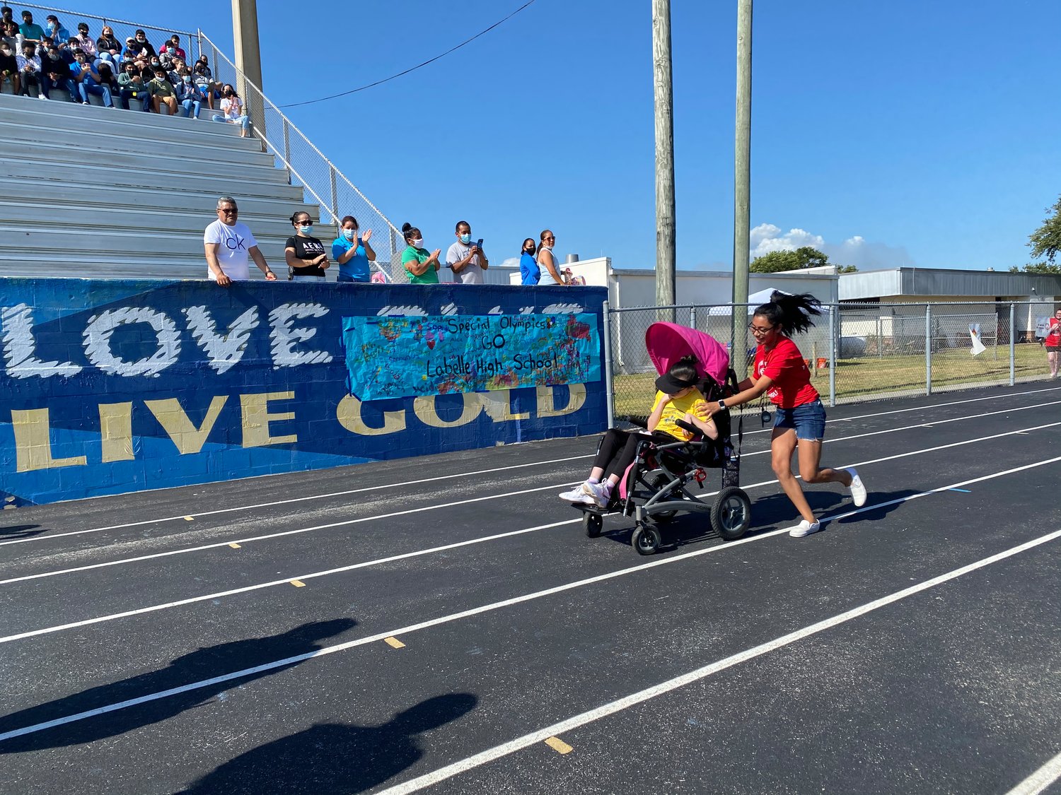 Natalie Cervantes wins the 25 Meter Wheelchair Race at the 5th Annual Hendry County Special Olympics End of Year Celebration.