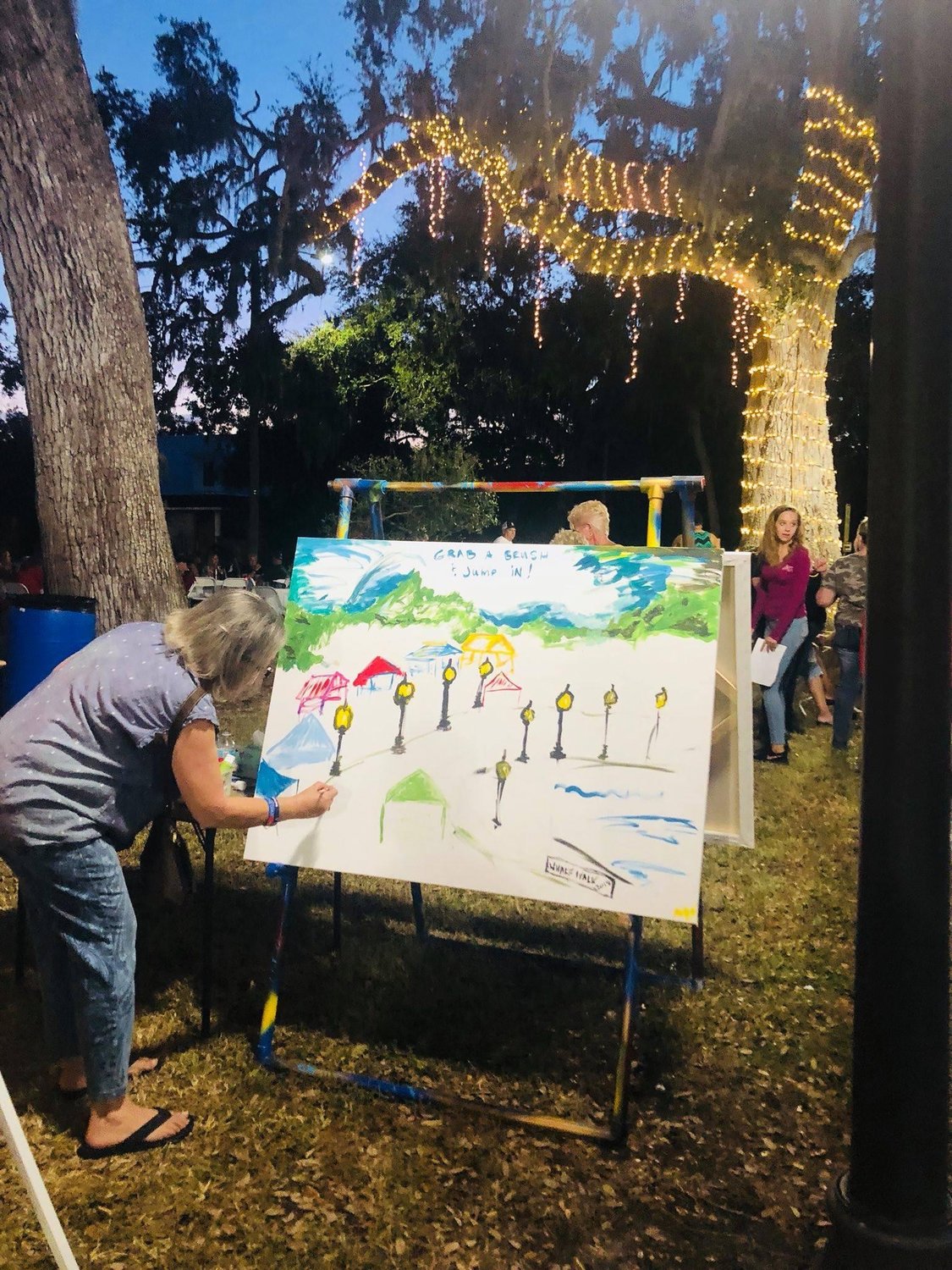 Wharf Walk, in years past, has been filled with interactive art activities like this community painting.