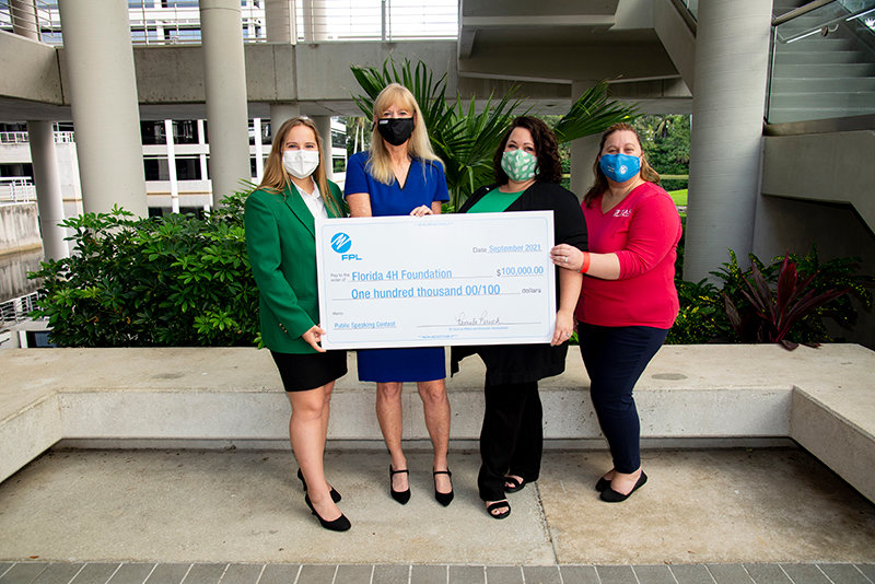 Left to right are Brooke Adams, Florida 4-H State Council officer from St. Lucie County;
Pam Rauch, vice president for external affairs and economic development at FPL;
Caylin Hilton, associate director of development for Florida 4-H;
Noelle Guay, UF/IFAS Extension Palm Beach County 4-H agent.