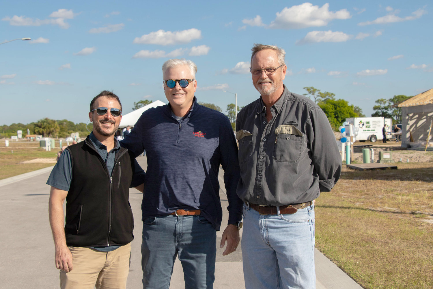 Lipman Family Farms Director of Community Relations Jaime Weisinger and CFO and Immokalee Foundation Board of Directors Treasurer Drew Yurko and Collier County Commissioner Bill McDaniel.