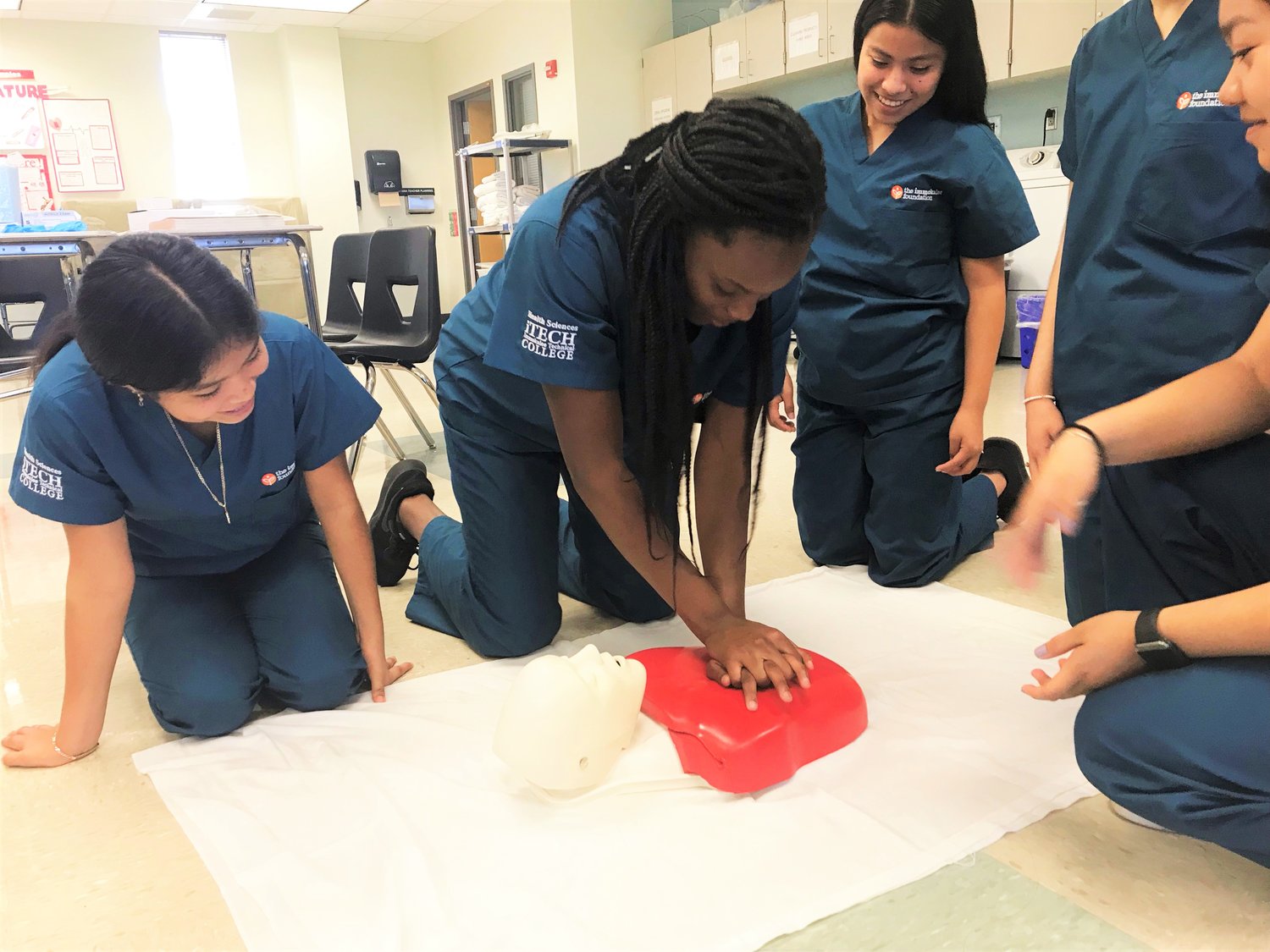 Students from the Healthcare Pathway practice CPR during The Immokalee Foundation’s Healthcare Summer Camp.