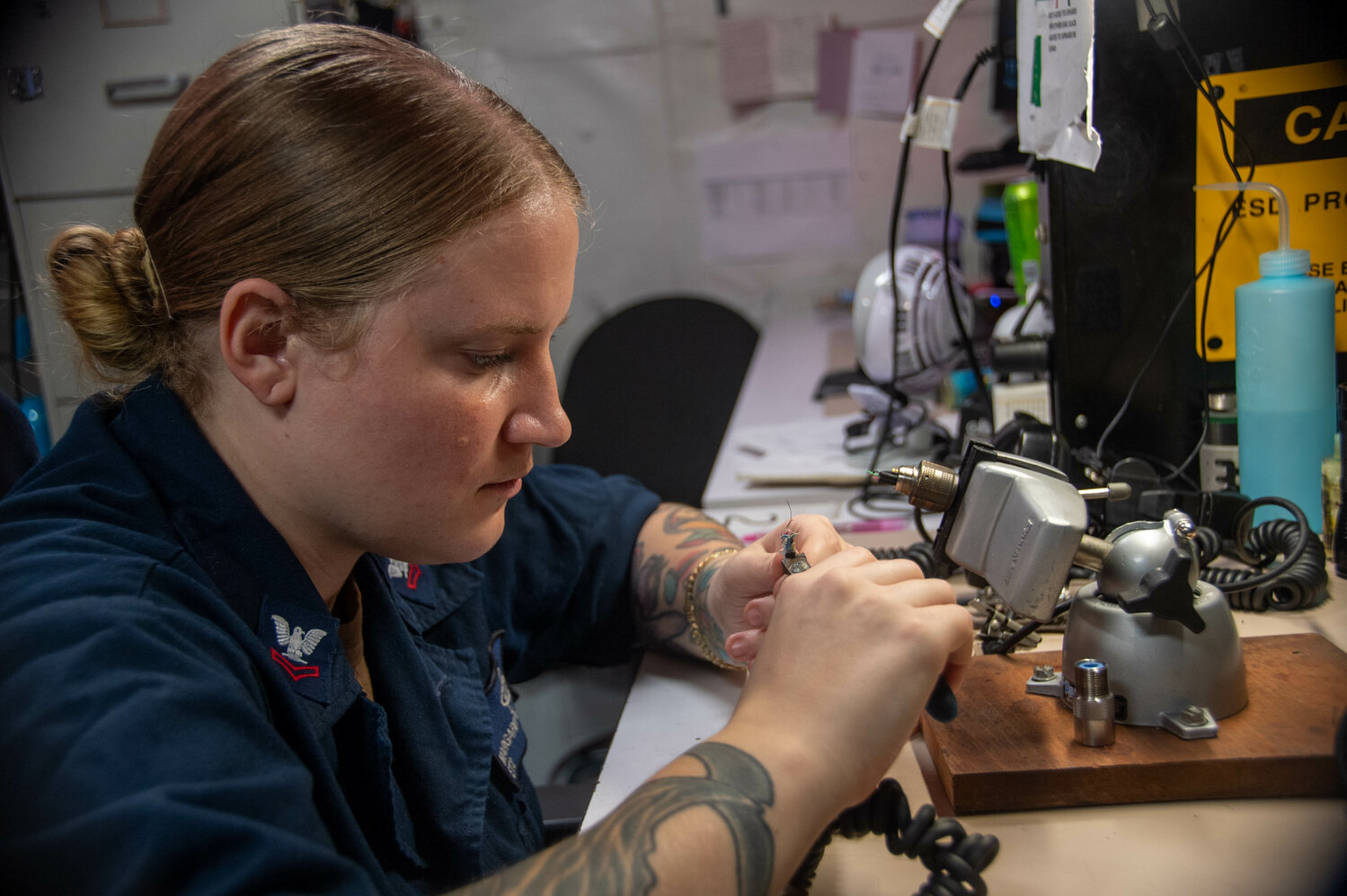 230421-N-KU796-1050 SOUTH CHINA SEA (April 21, 2023) U.S. Navy Electronics Technician 2nd Class Margarita Gonzalez, from Okeechobee, Fla., repairs a headset cable aboard the aircraft carrier USS Nimitz (CVN 68). Nimitz is in U.S. 7th Fleet conducting routine operations. 7th Fleet is the U.S. Navy's largest forward-deployed numbered fleet, and routinely interacts and operates with allies and partners in preserving a free and open Indo-Pacific region. (U.S. Navy photo by Mass Communication Specialist 2nd Class Samuel Osborn)