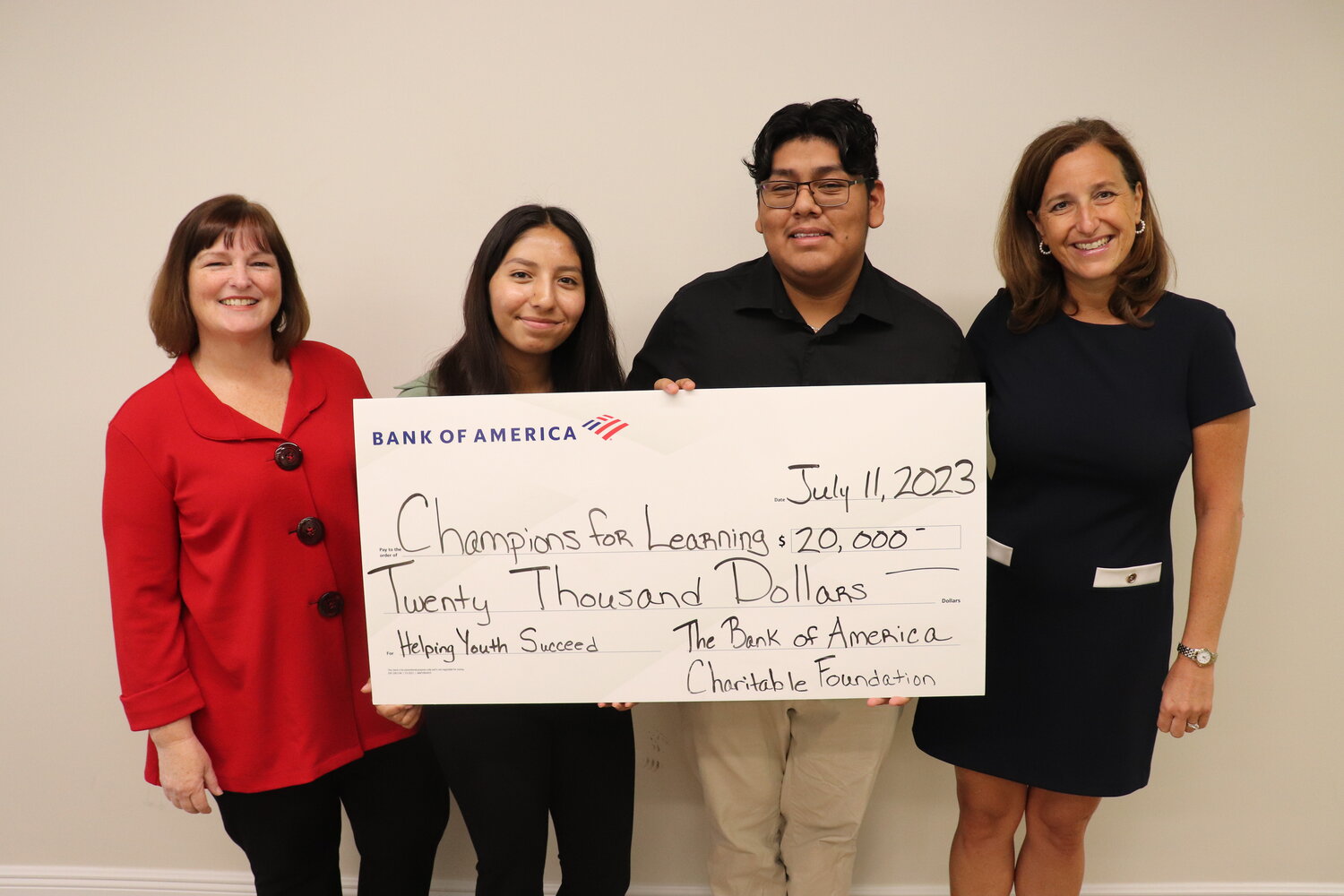 Bank of America Charitable Foundation present a $20,000 check to The Education Foundation of Collier County - Champions For Learning to help invest in students’ educational success.