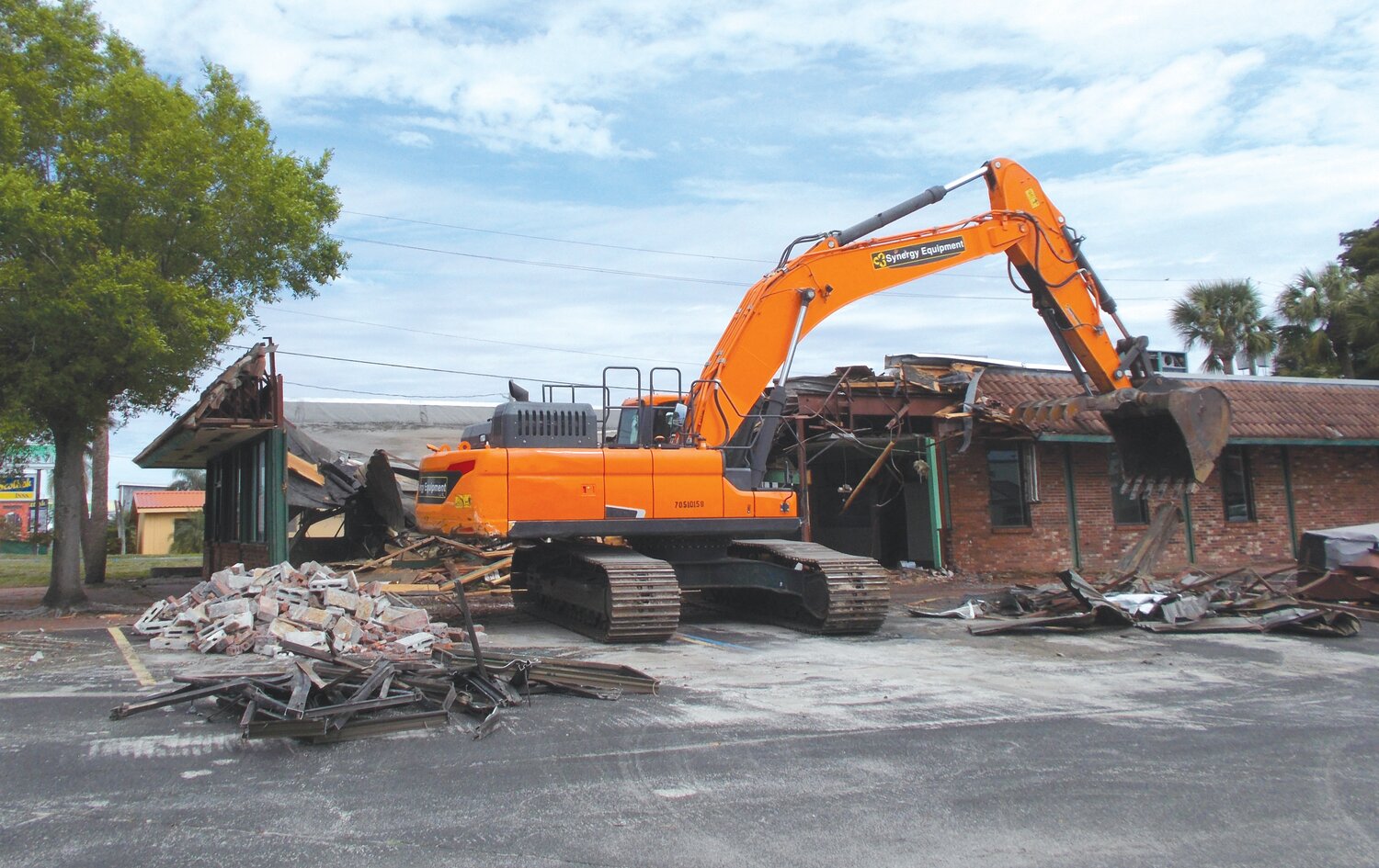 OKEECHOBEE -- The building that once housed Spring Garden restaurant was demolisted on March 6. The materials were sorted for recycling.  A new Slim Chicken Restaurant will be built on the site. [Photo by Raye Deusinger]